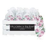 20 pairs of pink rose flip flops in a personalized chalkboard crate